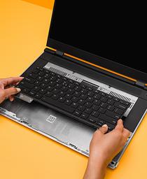Hands with Framework Laptop 16 Keyboard