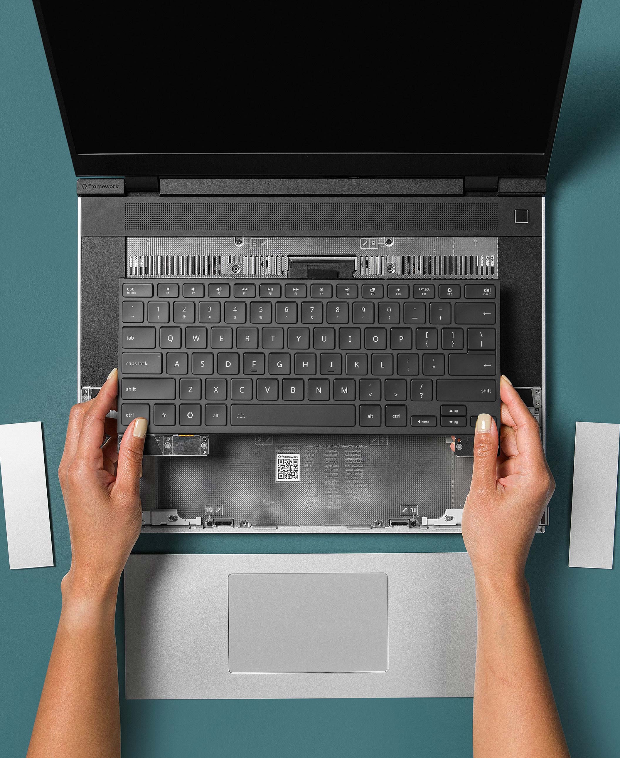 Hands with Framework Laptop 16 Keyboard
