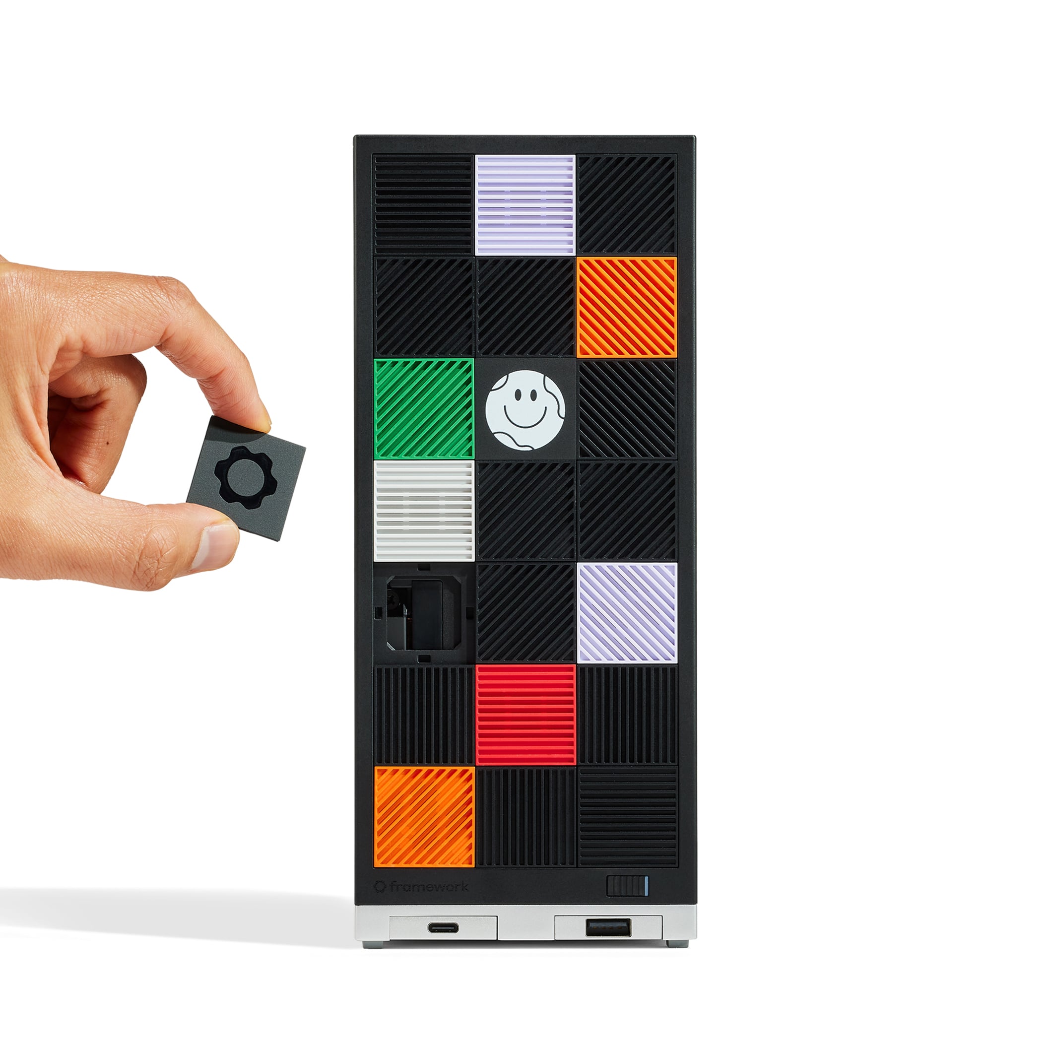 Image of Framework Desktop featuring Colorful Tiles with Hand