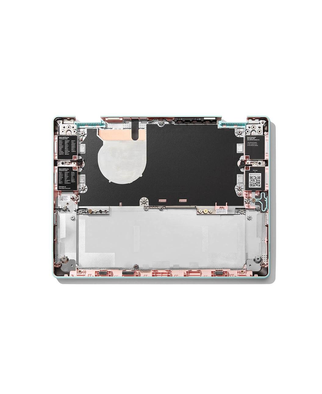 Interior top down shot of Framework Laptop 12 Bottom Cover Kit in Bubblegum