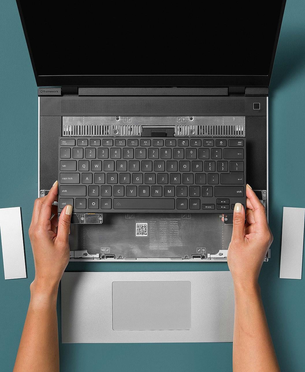 Hands with Framework Laptop 16 Keyboard